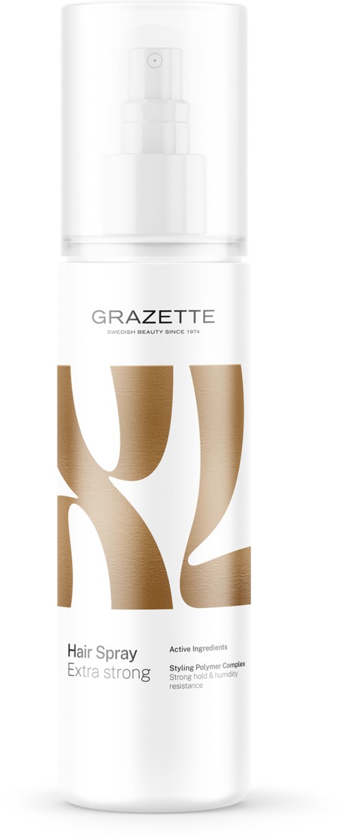 Een witte fles met sprayspuit, gemarkeerd 'GRAZETTE Hair Spray Extra strong' met decoratief goud ontwerp.