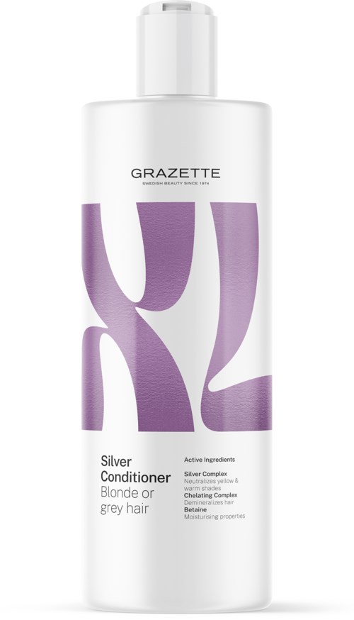 En hvit flaske med balsam for hår med lilla bokstaver og tekst for blondt eller grått hår.