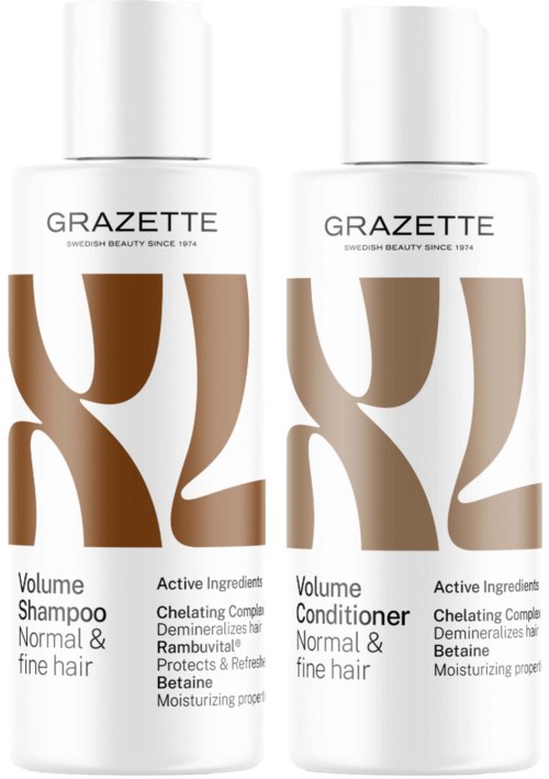 Two white bottles labeled 'GRAZETTE' for hair care, one for volume shampoo and one for conditioner, designed for normal and fine hair.