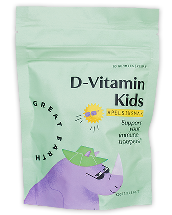Grönt påse visar D-Vitamin Kids gummibjörnar med en lila djurfigur och en gul sol, som stöder imunhälsa.