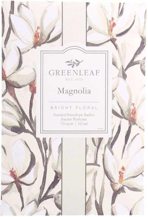 Kukkakuva, jossa valkoisia kukkia ja tummia oksia, ja keskellä Greenleaf Magnolia tuoksupussin etiketti.