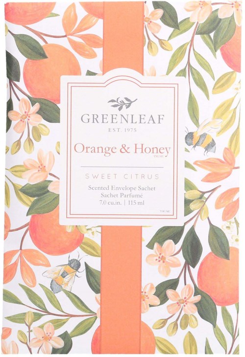 Kukkakuvio, jossa on appelsiineja ja kukkia, merkiten tuoksuva kirjekuoren pussi, nimeltä Greenleaf Orange & Honey, sitrussedillä.