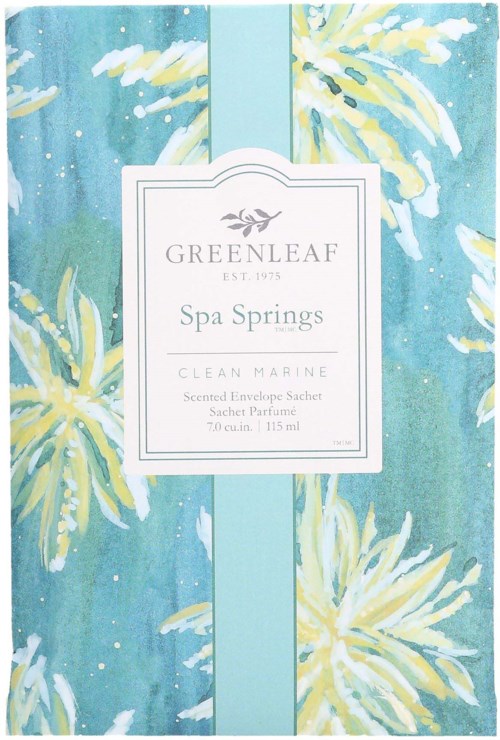 Värikäs pakkaussuunnittelu Greenleaf Spa Springs -tuoksuiselle kirjekuoreen jaettu trooppisista keltaisista kukista ja sinivihreästä taustasta.