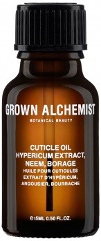 Liten brunflaske merket 'Grown Alchemist' med oransje og hvit tekst, inneholder neglepleieolje.