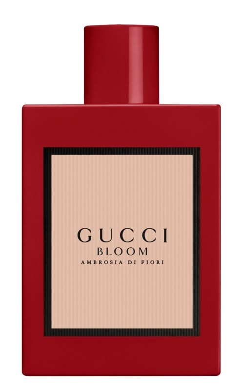 Punainen pullo Gucci Bloom -parfyyliä, suorakulmainen ja yksinkertainen etiketti.