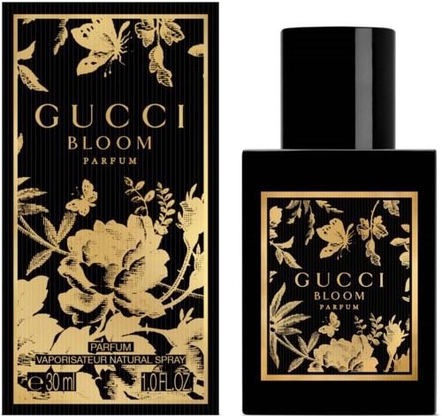 A black and gold floral design on perfume packaging and bottle, with the brand name 'Gucci Bloom' displayed.