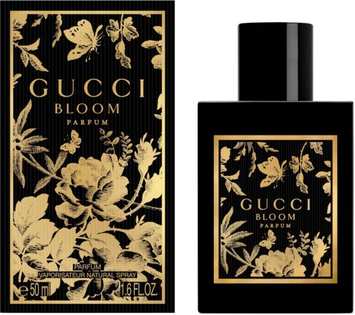 A black perfume bottle and box with gold floral and butterfly designs, labeled 'GUCCI BLOOM PARFUM.'
