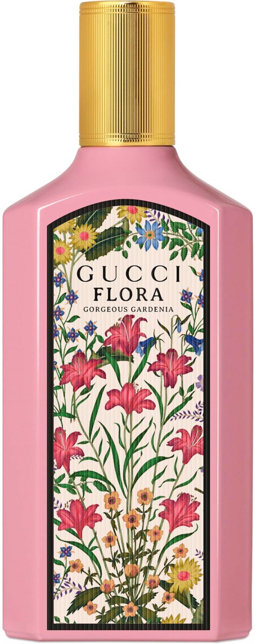 En rosa flaska med guldkork och en färgstark blomsteretikett för Gucci Flora parfym.