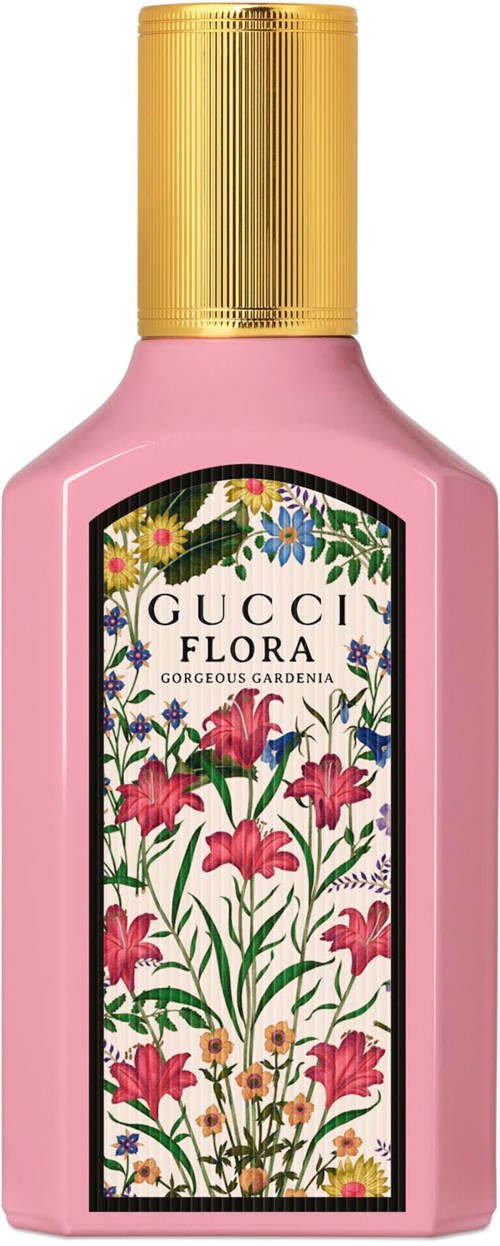 En rosa flaska med en etikett med blommor som säger 'Gucci Flora'. Korken är guld. Etiketten har färgglada blommor och blad.