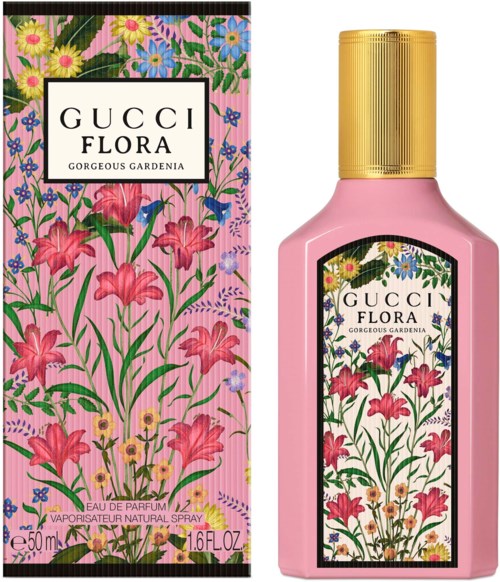 En rosa flaska och box med blommönster, etiketter säger 'Gucci Flora Gorgeous Gardenia.'