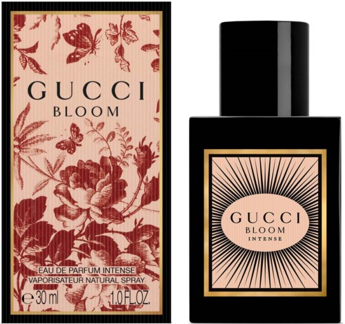 A black perfume bottle with a label showing a sunburst pattern and the words 'GUCCI BLOOM INTENSE'.