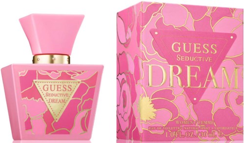 En rosa parfymeflaske og eske med gull- og rosa blomsterdesign, merket "GUESS SEDUCTIVE DREAM" for kvinner.