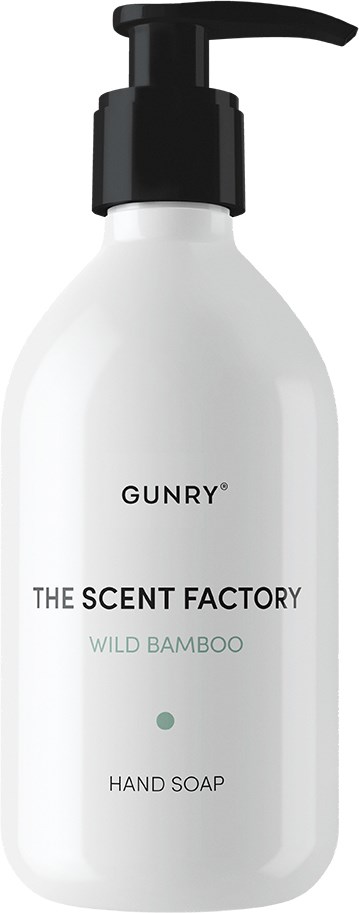 En vit flaska med svart pump märkt 'Gunry,' 'The Scent Factory,' 'Wild Bamboo' och 'Hand Soap.'