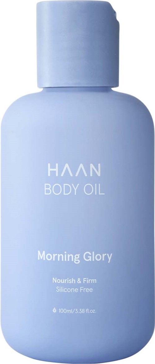 A light blue bottle labeled "HAAN Body Oil" with "Morning Glory" scent, nourishing and silicone free, 100ml.