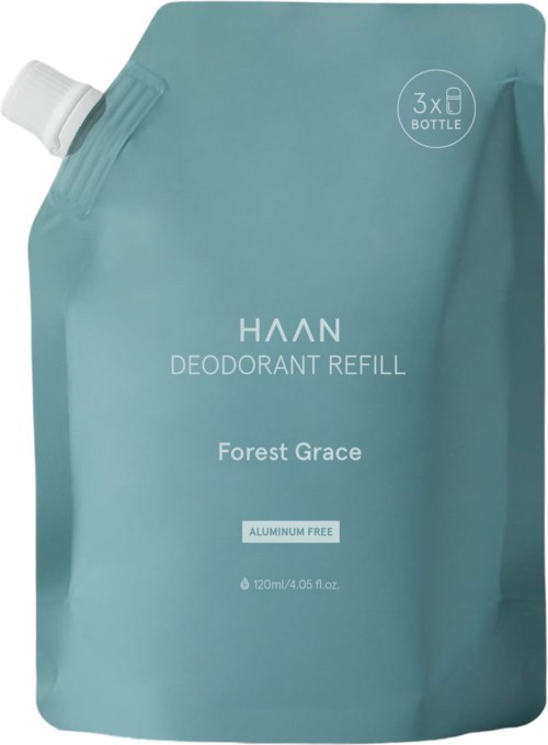 A teal refill pouch for deodorant labeled 'Forest Grace' with a small white spout at the top.