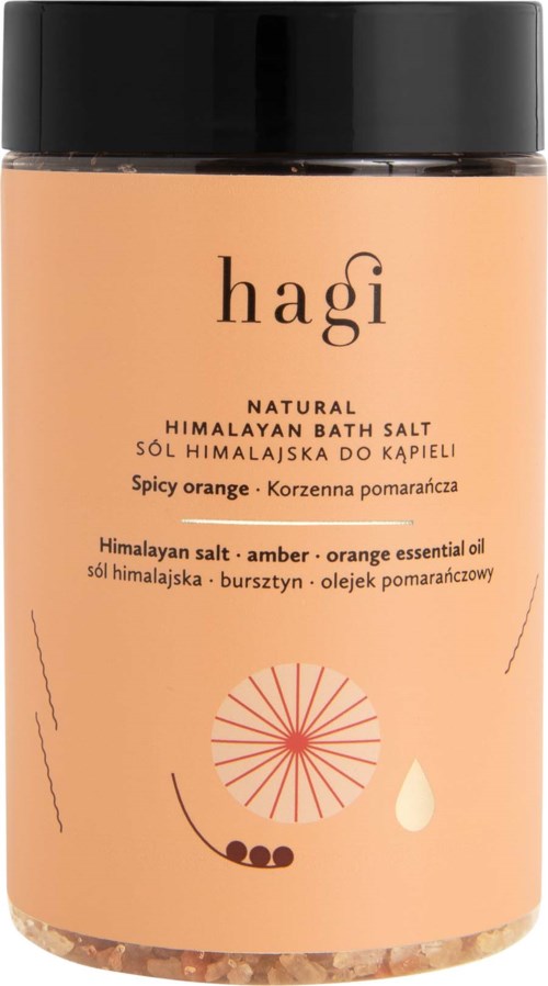 A container of Himalayan bath salt with spicy orange scent and a simple label design.