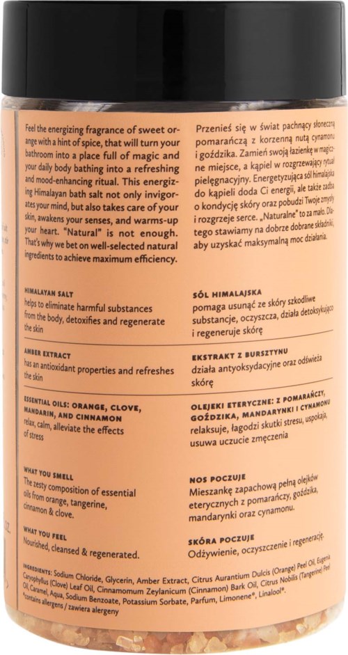 A container with a label, possibly for a cosmetic or health product, has text about ingredients and benefits.