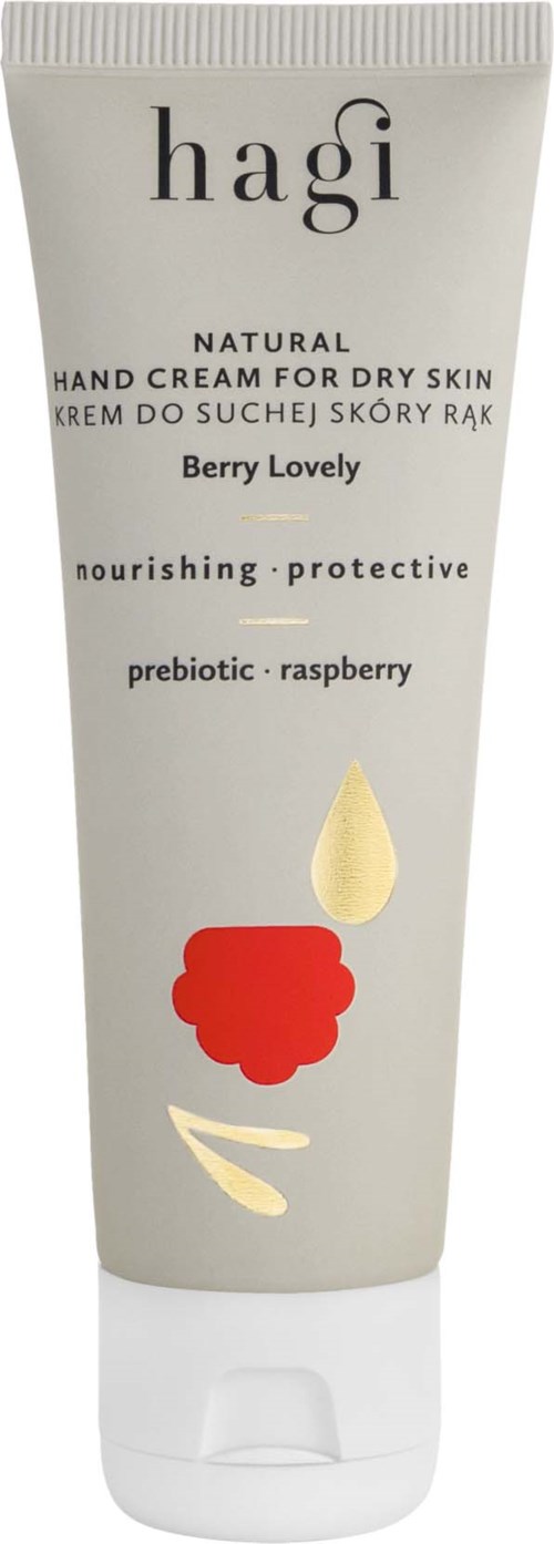 En vit tub med Hagi handkräm med text om närande, skyddande och halloningredienser, med en röd och krämfärgad design.