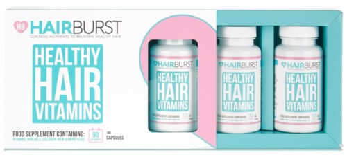Eske med tre flasker merket 'Healthy Hair Vitamins' og en separat etikett med piller inne i.