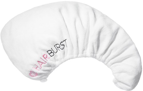 A white headband with the words "HAIR BURST" embroidered in black and pink, made of soft fabric.