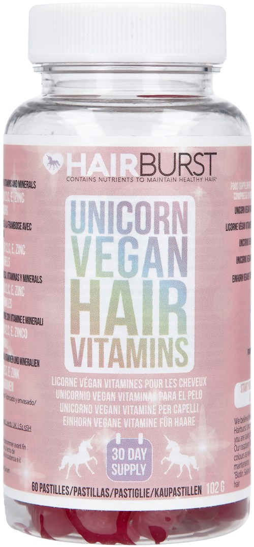 Vegan hår vitaminer i en klar krukke med rosa, hvite og pastellfargede etiketter, med unicornbilder.