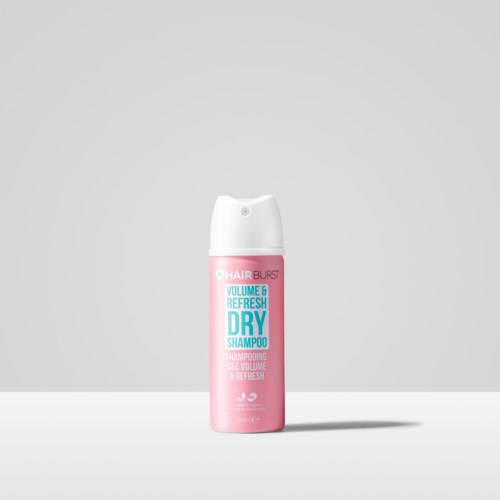 A pink bottle of dry shampoo with a white cap, labeled "Volume & Refresh" and "Hair Burst."