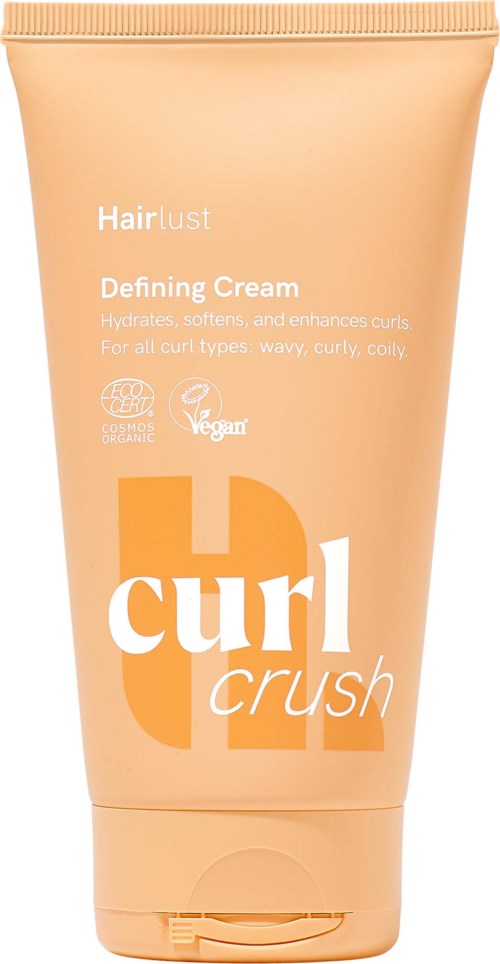 Haarstylingscrème in een beige tube met label curl crush, bedoeld om krullen te hydrateren en te definiëren voor alle haartypes.