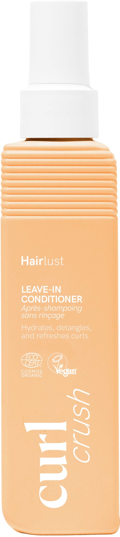 Persikan värinen Hairlust Crush hoitolaitteenhoitoaine pullo valkoisella suihkulla.