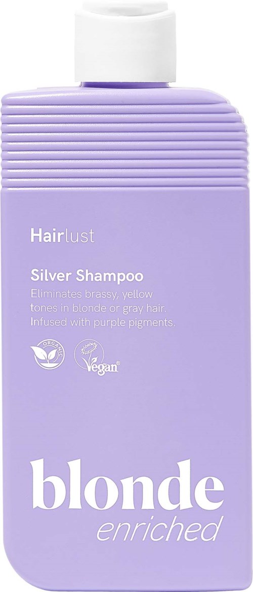 Lichtpaarse fles met zilvershampoo en witte dop, geschikt voor blond en grijs haar, veganistisch.