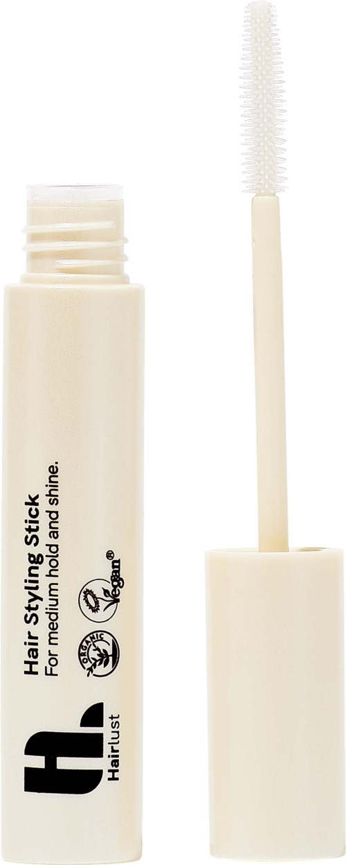Een wit haarstylingproduct met een applicator en een verwijderbare dop.