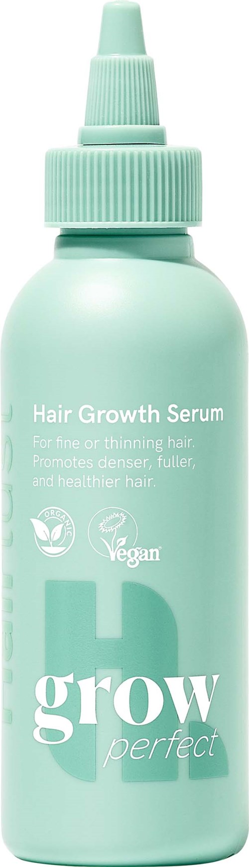 Een mintgroene fles haarboosterserum met pumpdop, gericht op gezond, voller en sterker haar.