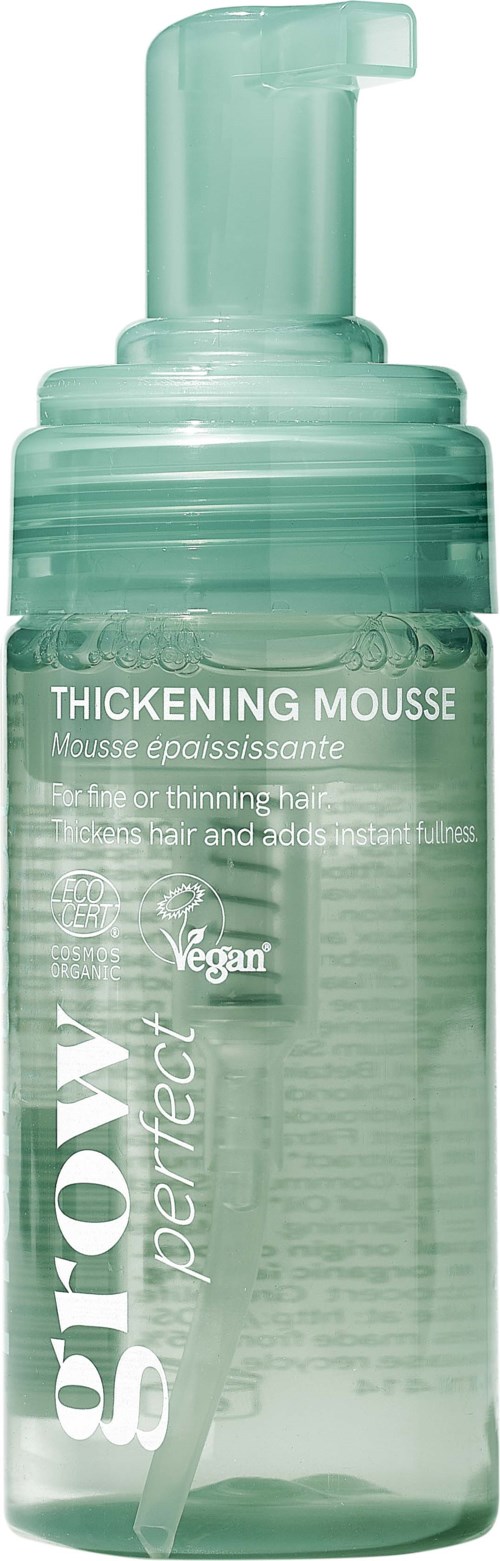 Duidelijke pompflacon met verdikkingsmousse, mintkleurig etiket en witte tekst, met focus op vegan ingrediënten.
