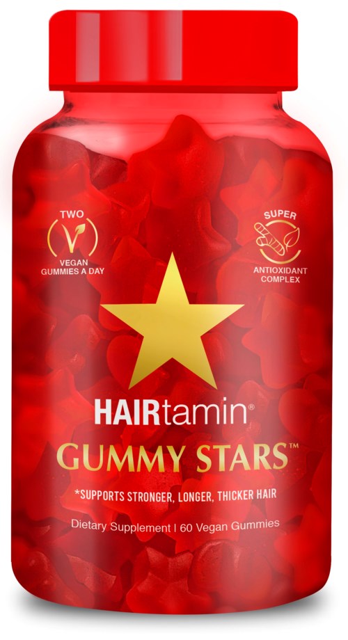 Rote Flasche enthält vegane Gummistars für Haarwachstum und -stärke. Hinweise auf Antioxidantien und tägliche Anwendung.