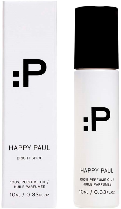 En vit flaska och låda med svart lock och en logo, märkt Happy Paul Bright Spice parfymolja.