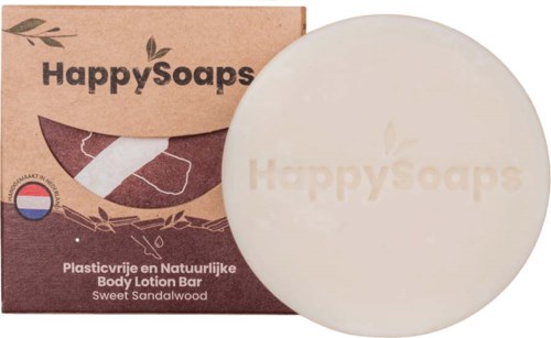 Solidi saippuapala, pakkauksessa ekohenkinen teema, merkintä 'HappySoaps' ja tuoksu 'Sweet Sandalwood'.