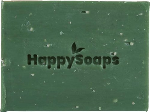 Green soap with a black logo and the text "HappySoaps" on it. The soap has a rough texture with small white spots.