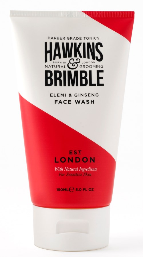 En röd och vit tub av Hawkins Brimble ansiktstvätt med naturliga ingredienser, för känslig hud, 150 ml.