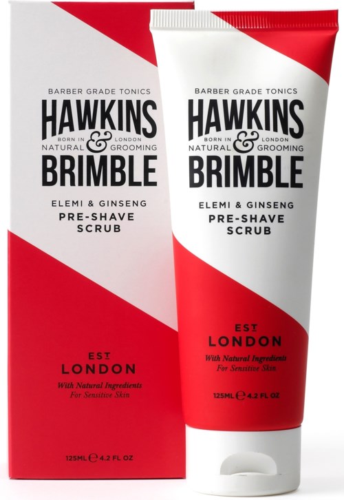 En tub och box av Hawkins Brumble pre-shave scrub, röd och vit design, för känslig hud, 125 ml.