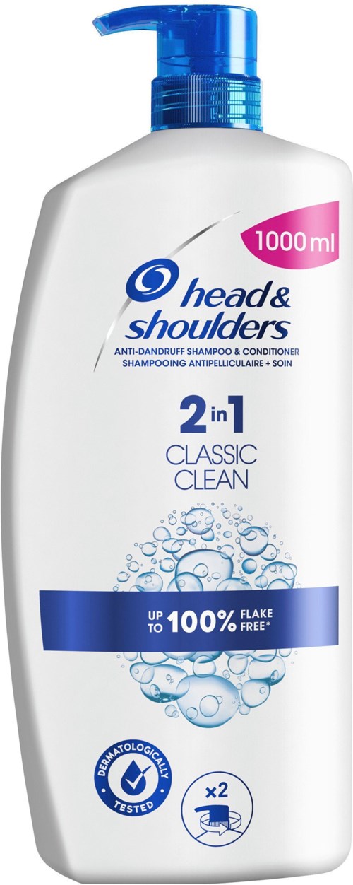 En hvit flaske med Head & Shoulders sjampo med blå detaljer og pumpe. Den viser 1000 ml og fremhever anti-flass.