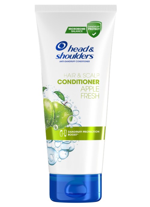 Eine weiße Tube Head & Shoulders Conditioner mit grünen und blauen Akzenten, Apfelbild und Text zum Schuppen-Schutz.