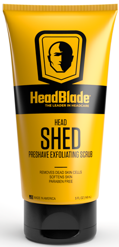 En gul og sort tube af HeadBlade Head Shed eksfolierende scrub til hudpleje, lavet i Amerika.