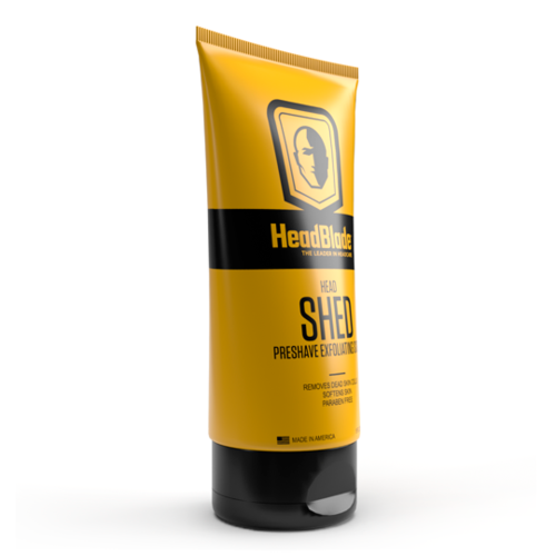 En gul og sort tube mærket HeadBlade S3 HED til hovedbarbering og eksfoliering.