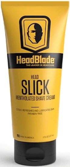Gul tube med HeadBlade Head Slick mentholeret barbercreme med sort låg og fed sort tekst.