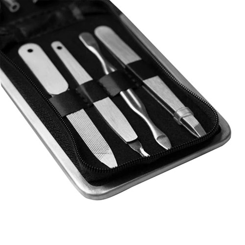 A set of manicure tools in a black zippered case, including files, tweezers, and cuticle tools.