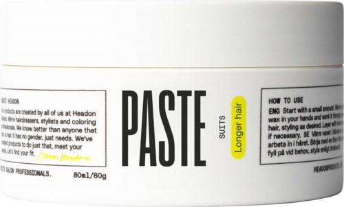 Ein Haarpflegemittelbehälter mit der Bezeichnung 'PASTE' für langes Haar und Anweisungen zur Anwendung.