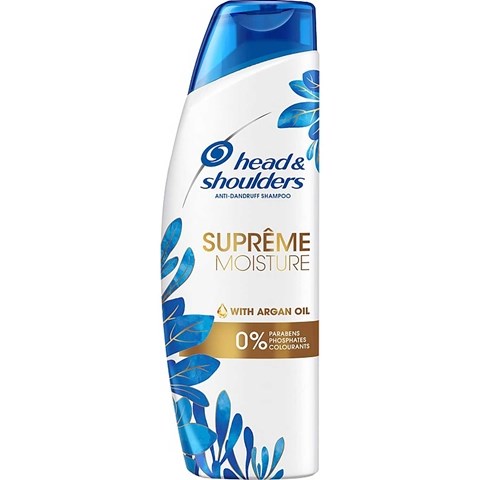 En hvit og blå flaske med Head & Shoulders shampoo med blå blader, merket Supreme Moisture med Arganolje.