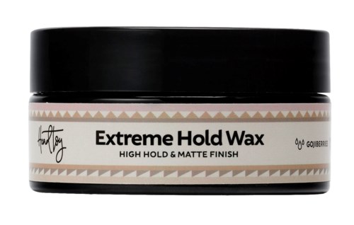En rund behållare med etiketten "Extreme Hold Wax" och ett svart lock, avsedd för stark fixering och matt finish.