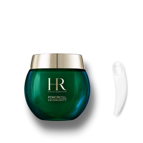 A green jar with a silver lid and a small clear spatula beside it. The jar has 'HR' and product name on it.