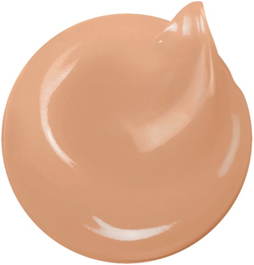 Ett runt beige objekt med en spetsig topp, ser slätt och glänsande ut, liknar en liten frukt eller dekorativt föremål.