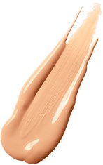 En beige flytande vätska utsmetad i ett streck, med en jämn och glansig yta, på vit bakgrund.